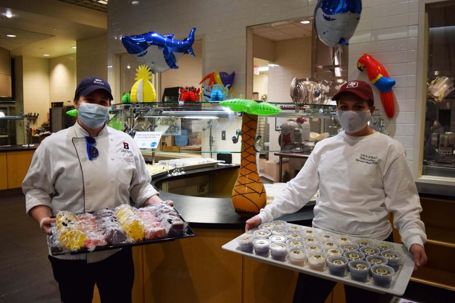 Head Baker Daisy Taylor, left, and Amanda Ouellette began preparing for Harvest dinner on Tuesday. They were particularly proud of the Bobcat cupcakes and the colorful fall cookies.