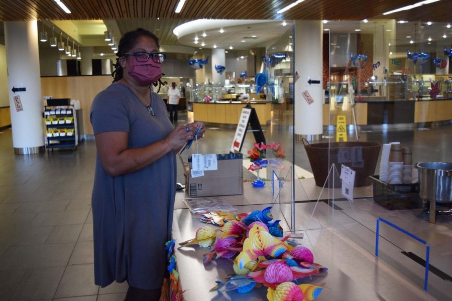 Noelle Chaddock, Vice President for Diversity and Inclusion, volunteered to help decorate. They said they are impressed with how well Commons has adapted to the pandemic restrictions this fall. 