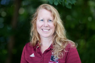 Coach Jennifer Hartshorn has coached her athletes to over 70 NCAA All-American performances and was designated NESCAC Women's Cross Country Coach of the Year in 2016 and 2019.