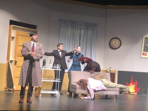 From left to right: Dhruv Chandra ‘25 (Chris), Ali Sheikh ‘23 (Dennis), Sydney Childs ‘24 (Annie), David Walker ‘24 (Robert), and Joaquin Torres ‘25 (Max) try to keep things moving smoothly in “The One-Act Play That Goes Wrong,” directed by Robby Haynos ‘22.