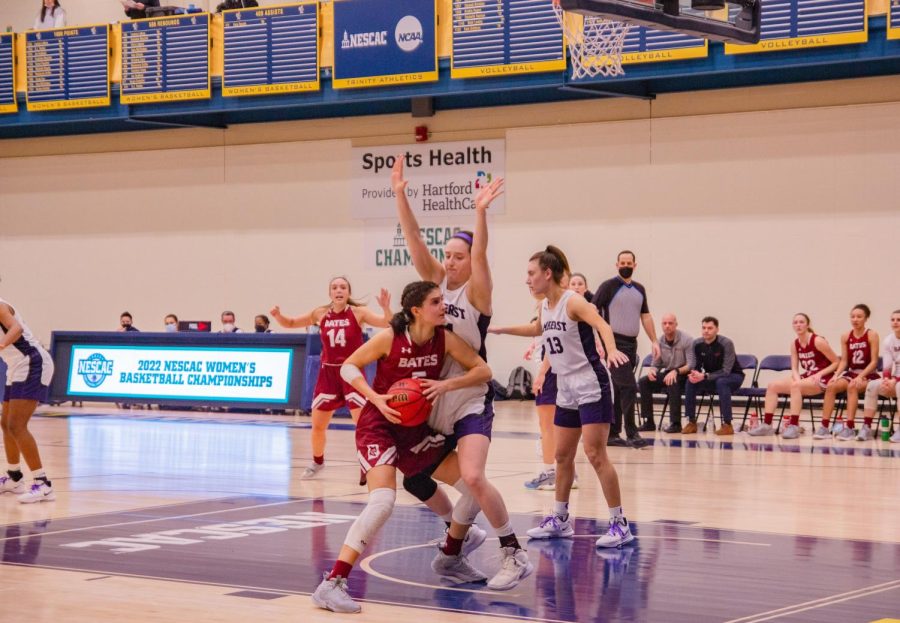 Junior Briana Gadaleta handles the ball against an Amherst player in the finals, which happened on Feb. 27. The Bobcats never dropped their lead against the Mammoths.