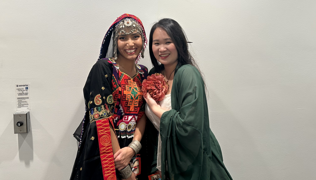 Sakina Saidi (Bates 26) models Afghanistan cultural clothing and Star Yang (Bates 24) models traditional Chinese clothing.