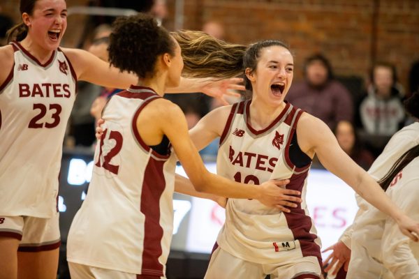 Guard Alexandra Long ‘25 celebrates with guard Alyson Kennedy ‘24 after Bates’ 57-72 win over Bowdoin on Feb. 2. Long led the game offensively with four blocks.