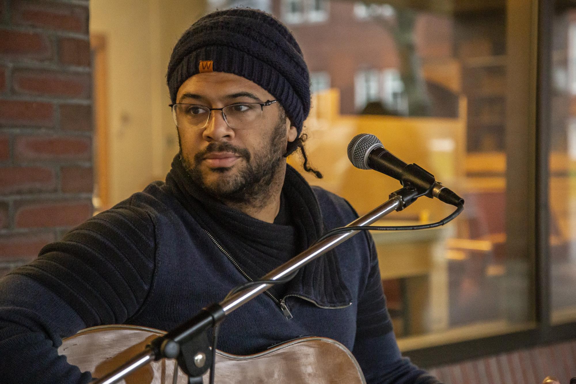 Professor Brian Evans performing "Busking for Reparations" under the library arcade. All photos provided by Kari Mosel.