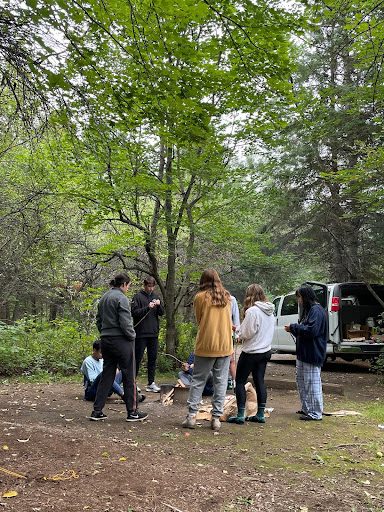 Gathering around the fire pit, playing icebreaker games and getting to know each other. 
