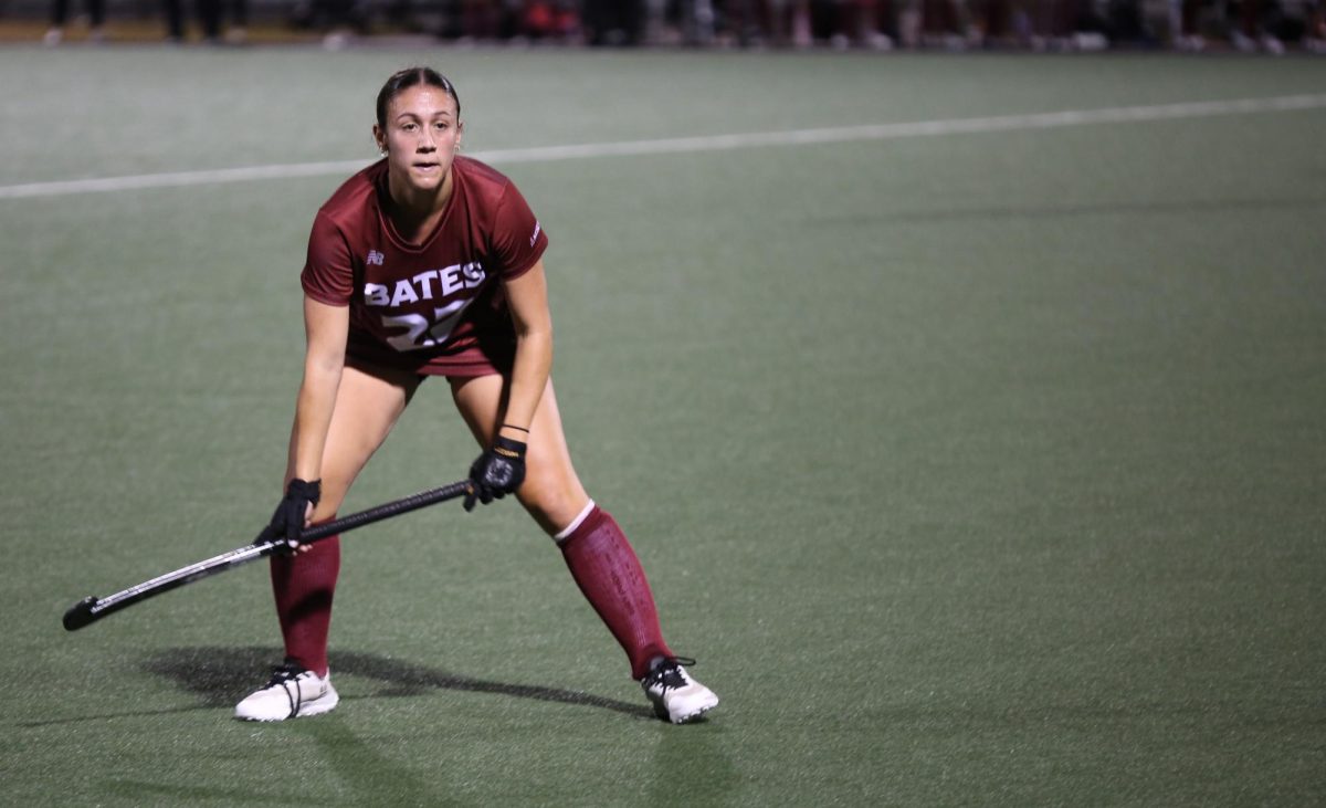 Number 22, Maria Femia '25 waits for the ball on the field during their game against Bowdoin College on Tuesday, Sept. 24.