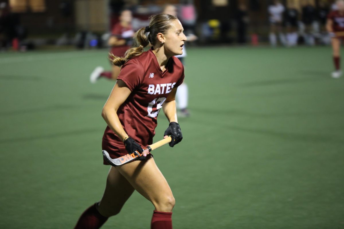 Number 13, Anna Cote '25 follows the ball during play against Bowdoin at their game on Tuesday, Sept. 24.