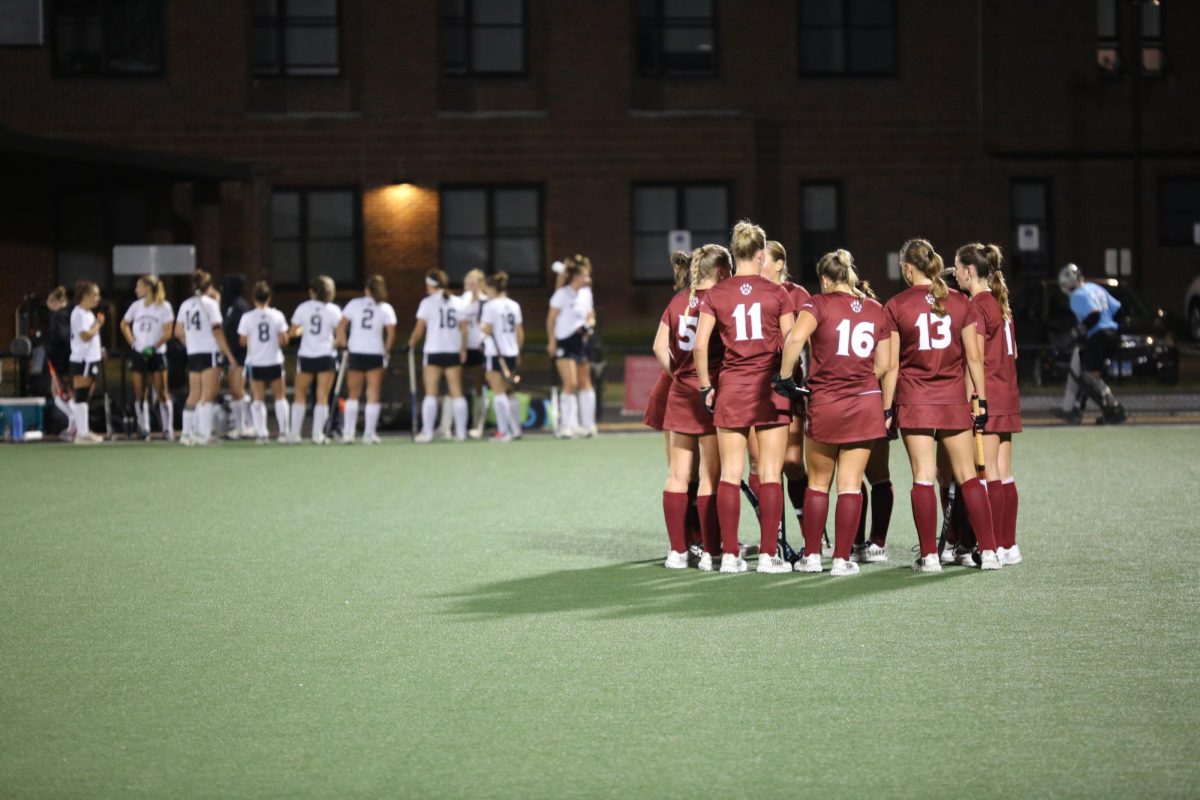 Women's Field Hockey team huddles before resuming play after halftime during their game on Tuesday, Sept. 24.