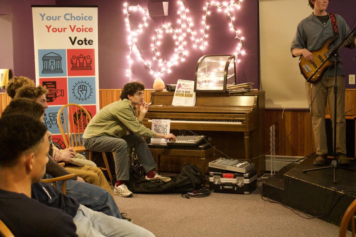 Jonah Yaffe of Bates Music Union assists with production of the Votes x BMU event at the Ronj on October 29th