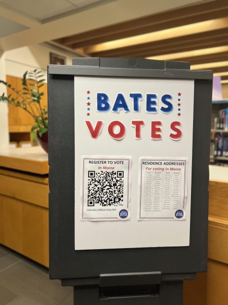 Bates Votes sign detailing relevant Maine voter information in Ladd Library.