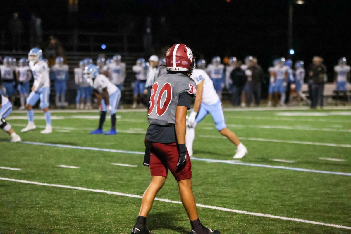 Marquez Narvaez-Estrada '28 lining up against Tufts.