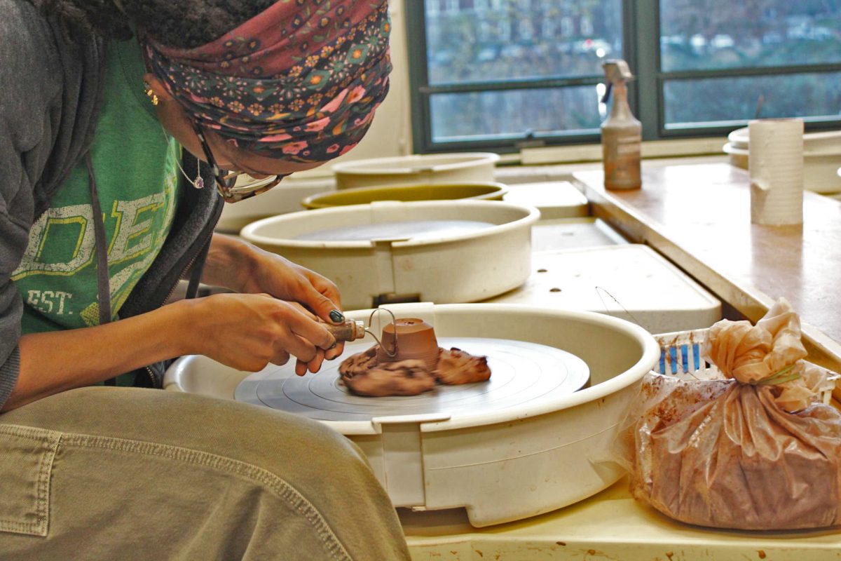 Talalech Clowney '28 works on her ceramics project on Monday, Nov. 11.