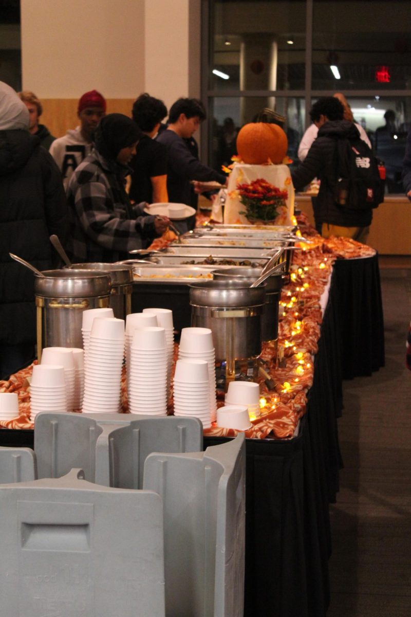 Students line up to grab food buffet-style at the annual Harvest Meal on Wednesday, November 20th.