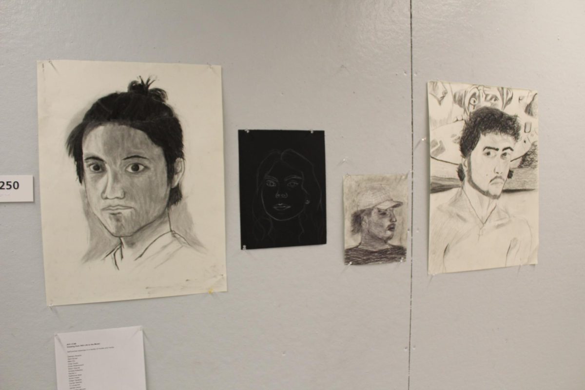 Students showcase their artwork nearby the drawing studio in Olin Arts Center. 