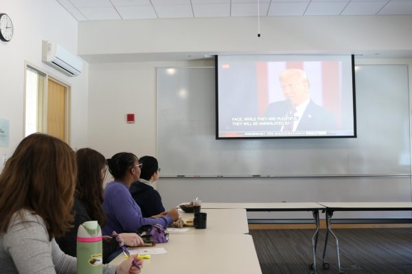 Students observe the newly inducted 47th president, Donald Trump, deliver the inaugural speech.