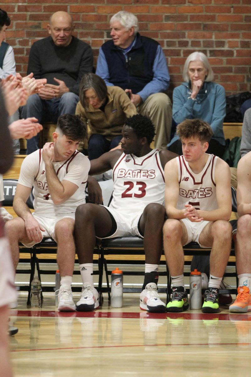 From left to right: Brady Coyne '26, Babacar Pouye '27, and Keenan Sparks '28 await their introductions as part of the starting lineup.