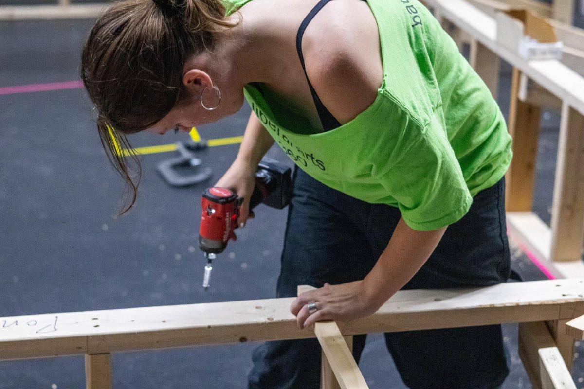 Mikayla Burse '26 works on the set of ‘METAMORPHOSES.’
