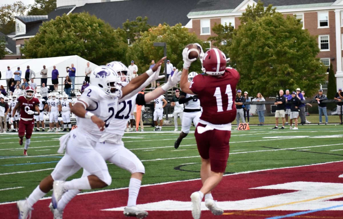 Quinn Carver '28 scores the tying touchdown forcing the Bates versus Amherst football game into overtime.