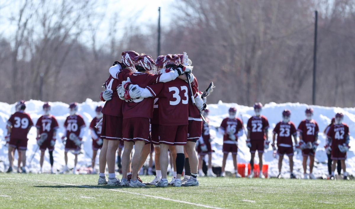 Bobcats huddled up midgame. Courtesy of Aaron Morse. 